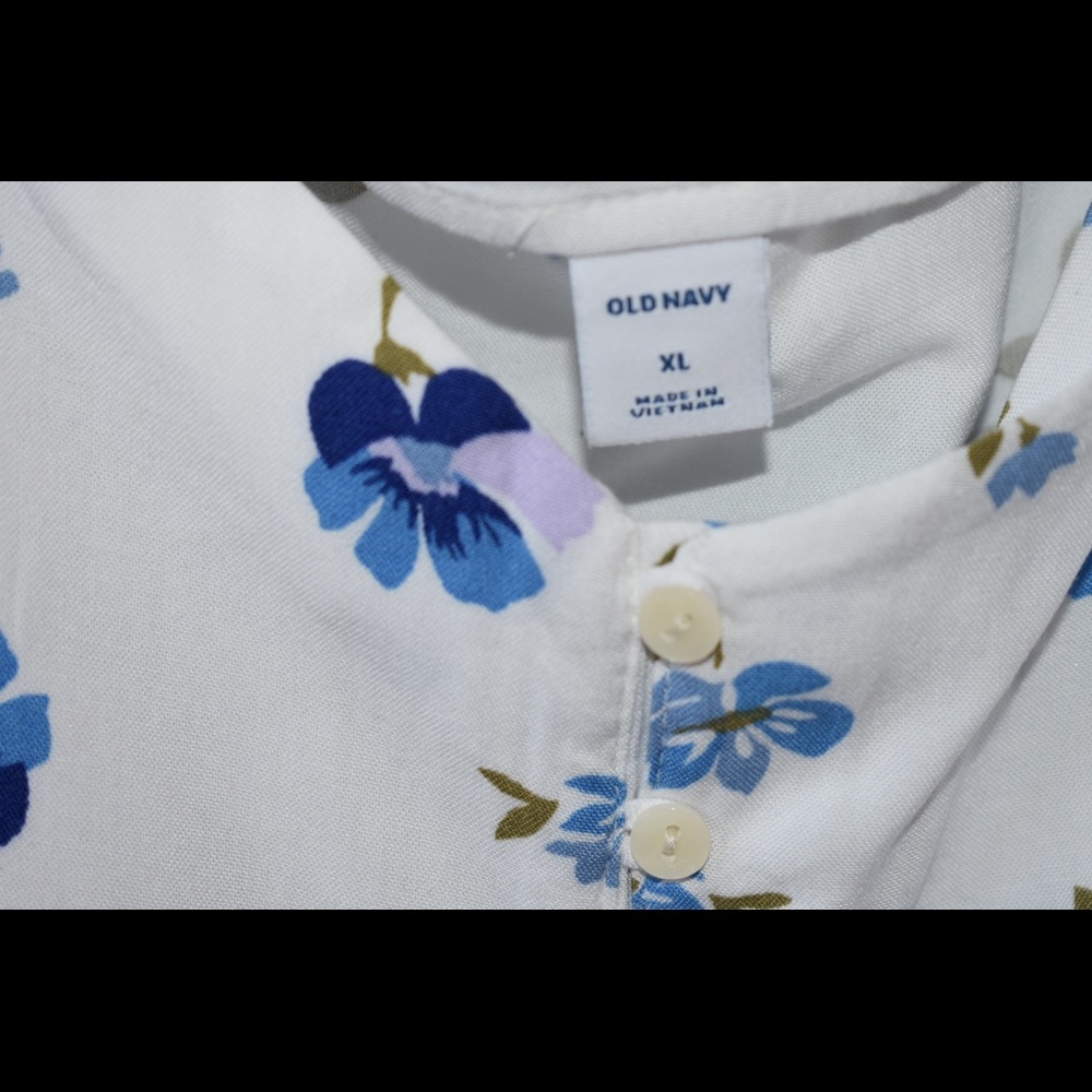White tank top with blue flower details